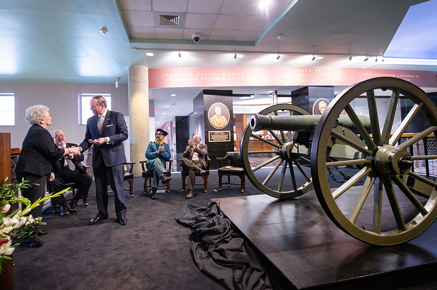 Dean Francis Coleman and MSU President Mark Keenum unveil a Civil War cannon.